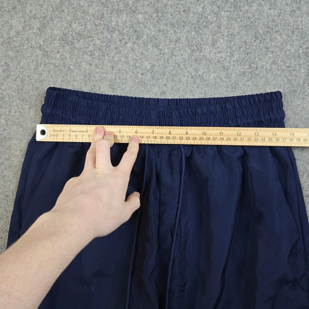 Nike‎ Track Pants Mens Medium Navy Blue Swoosh Logo Cuffed Joggers Sportswear